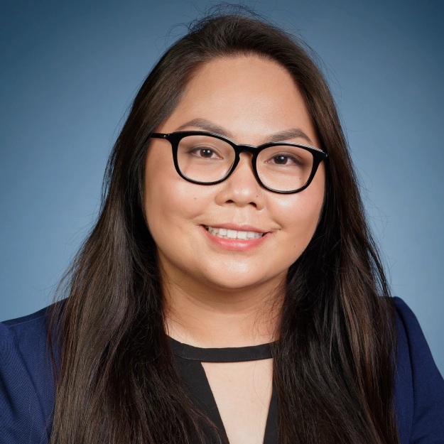 Dr. Yvonne Tran smiling at the Hapii Dental clinic in Austin.