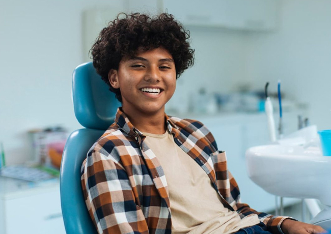 Teen dentistry dental visit in Austin, TX at Hapii Dental